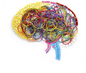 Creative concept of a human brain made of drugs, pills and colorful rubber bands as a memory illustration.